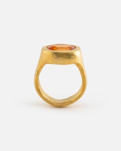 Ring in Fine Gold with Oval Hessonite