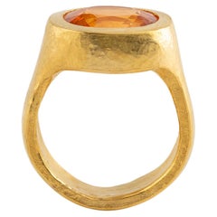 Ring in Fine Gold with Oval Hessonite