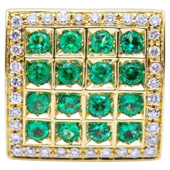 Ring aus Gold mit Diamanten und Smaragden. im Angebot