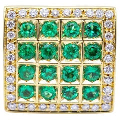 Ring in Gold with Diamonds and Emeralds.