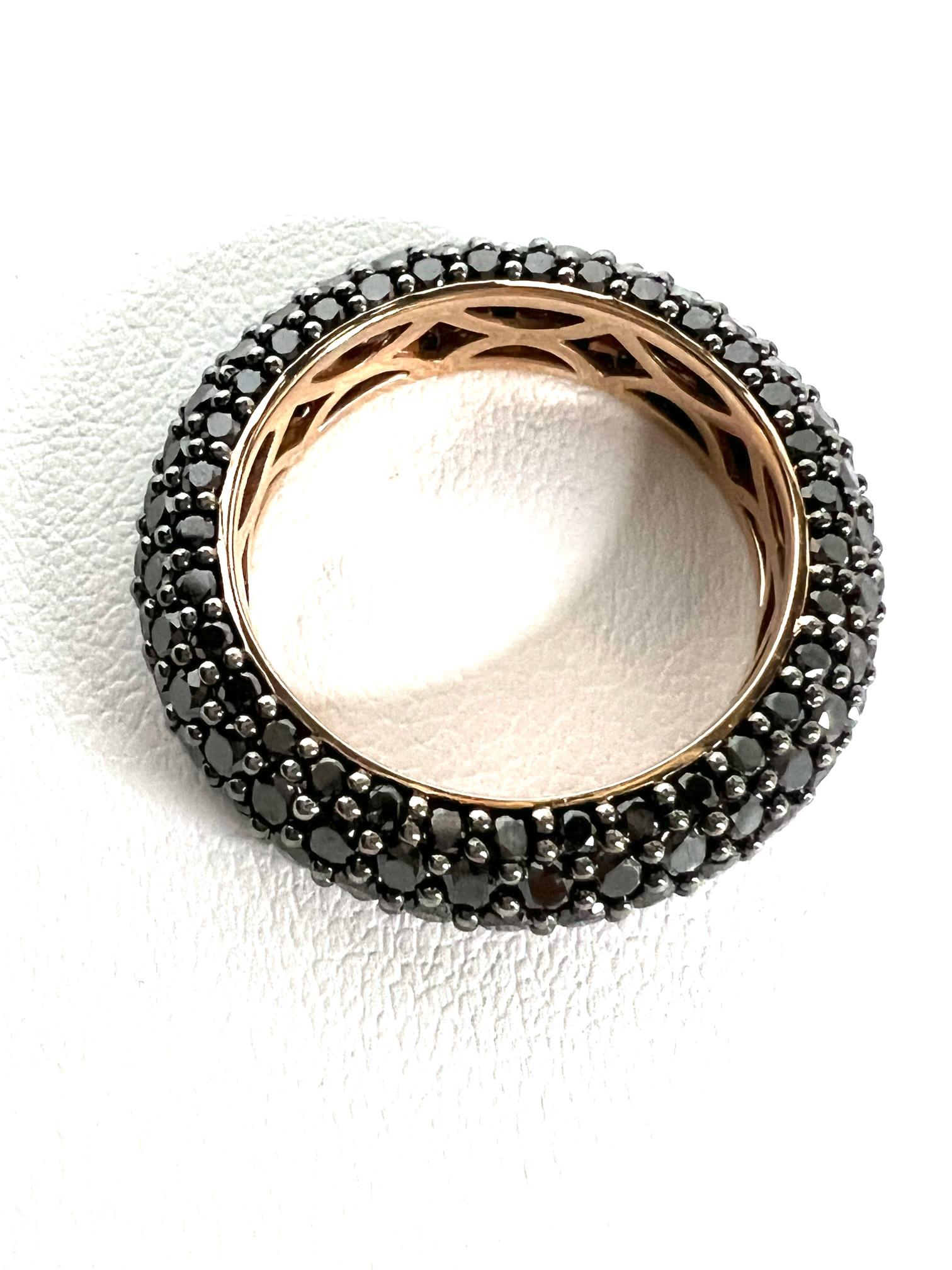 Thomas Leyser is renowned for his contemporary jewellery designs utilizing fine gemstones.

1 ring in 18k red gold 5,1gr. with 165 black diamonds treated, round 1.3mm, 3,95cts..

This ring size 56 (7,5) is unsizable.