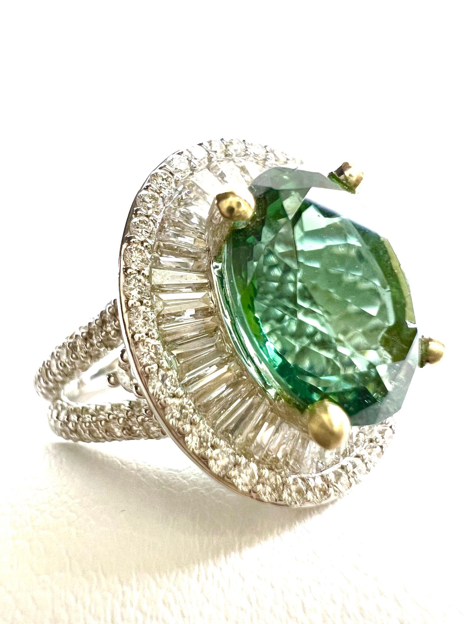 Oval Cut Ring in White Gold with Green Tourmaline and Diamonds For Sale
