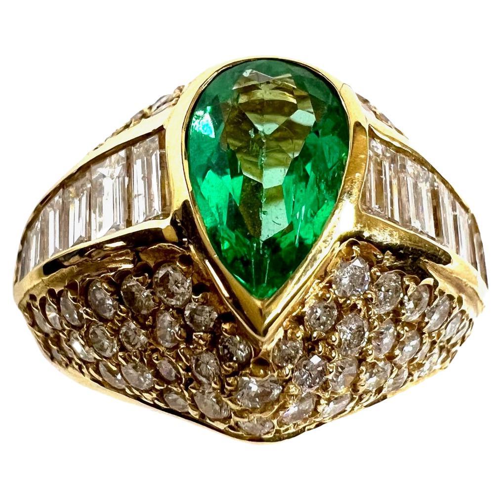Ring in Yello Gold with 1 Emerald and Diamonds For Sale