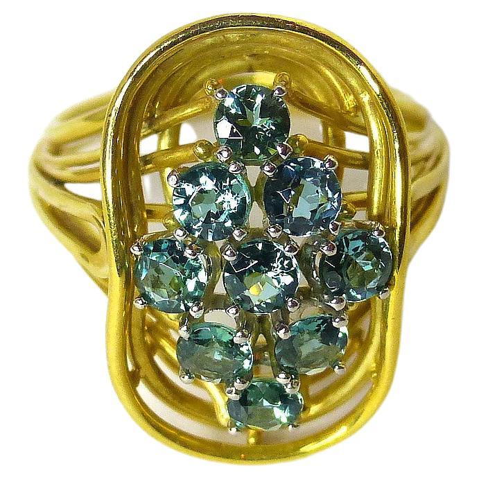 Ring in Yellow Gold with green Tourmalines