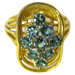 Bague en or jaune avec tourmalines vertes