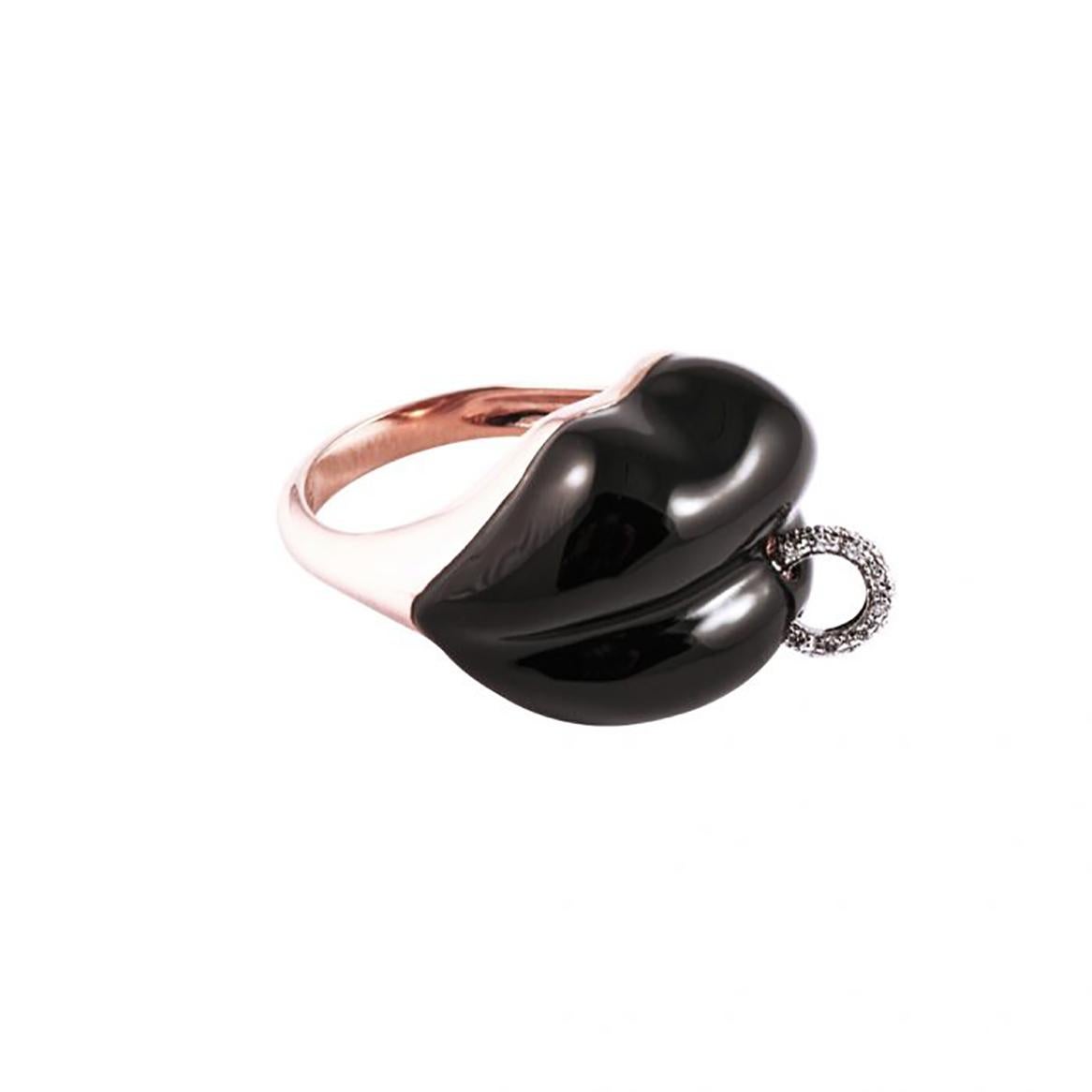 Ring  in 18-karat rose gold band,  black enamel lips and white diamond piercing
This item comes from the 