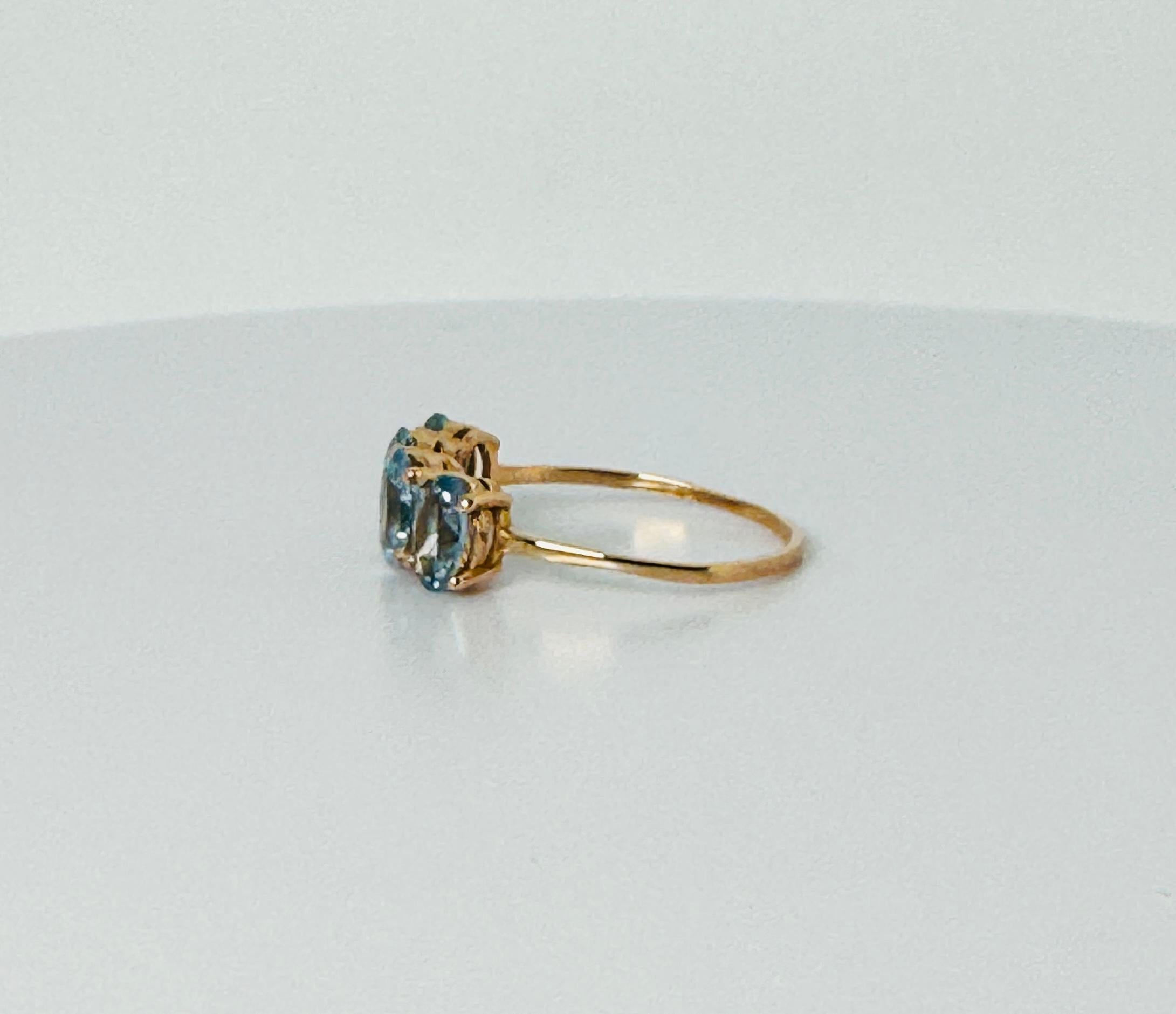 Ring aus 18 Karat Rotgold mit 4 schönen ovalen facettierten Aquamarinen im Zustand „Gut“ im Angebot in Heemstede, NL