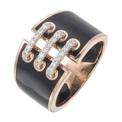 Used Ring made using Black Ceramic n 18kt Rose gold with natural diamonds
