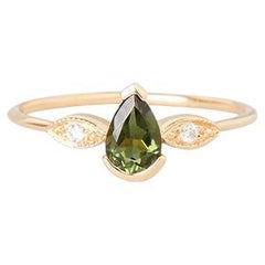 Ring Mademoiselle aus 18 Karat Gold mit grünem Turmalin und Diamanten