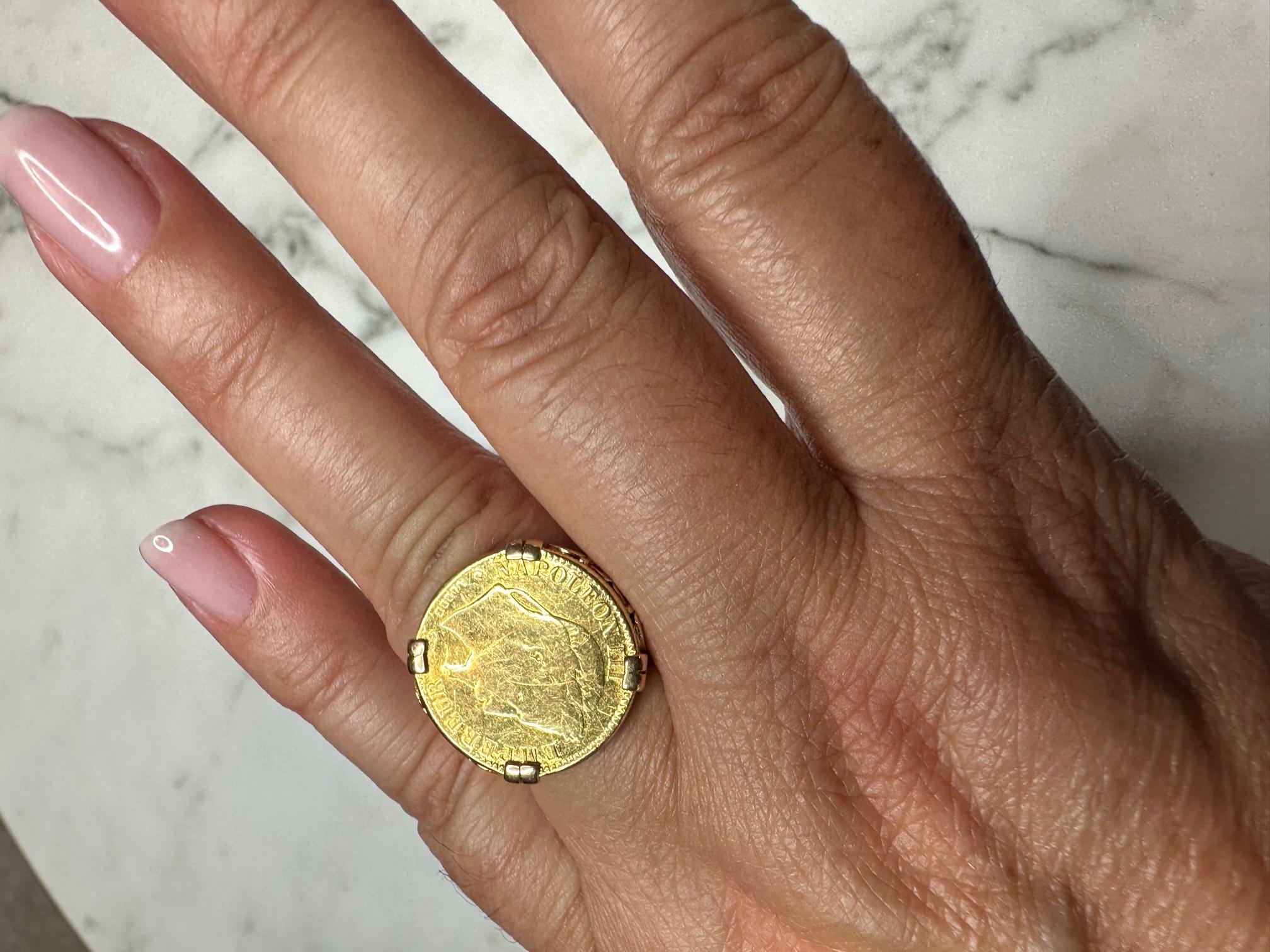 Ring Napoleon III Coin Yellow gold Solid 18 Karat 

This magnificent ring is a true testament to the 1970s, combining the elegance of history with the craftsmanship of jewellery. The 10 franc Napoleon III coin dating from 1864 that surmounts the