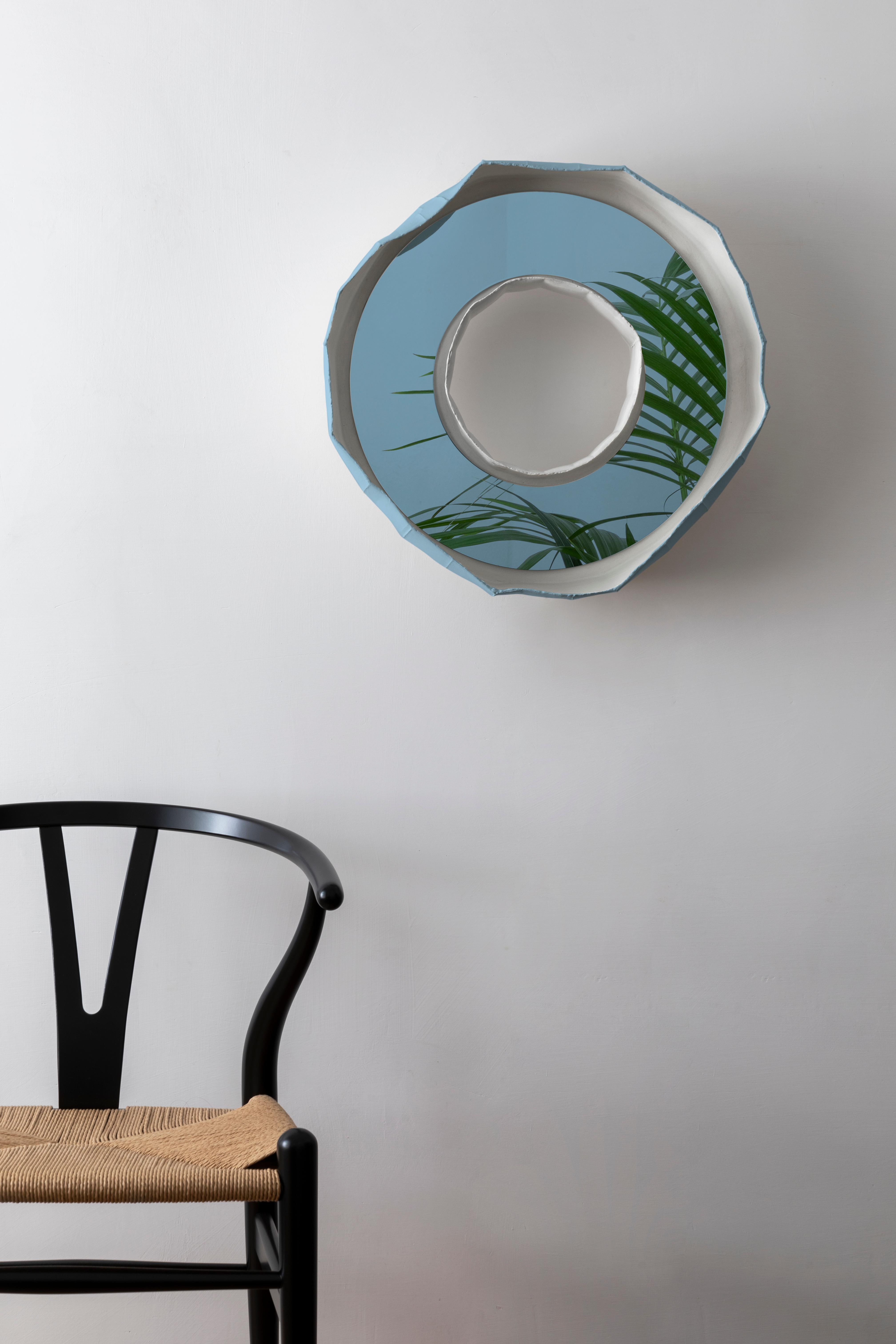 RING Nova, a stunning ceramic mirror handmade in Italy, one of 2 designs that make up the collection REFLECTIONS, the result of a collaboration between artist Paola Paronetto & designer Giovanni Botticelli, that integrates ceramic with colour and