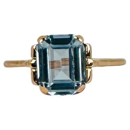 Ring of 18 carat rosé gold with emerald cut aquamarine of 1.00 carat For Sale