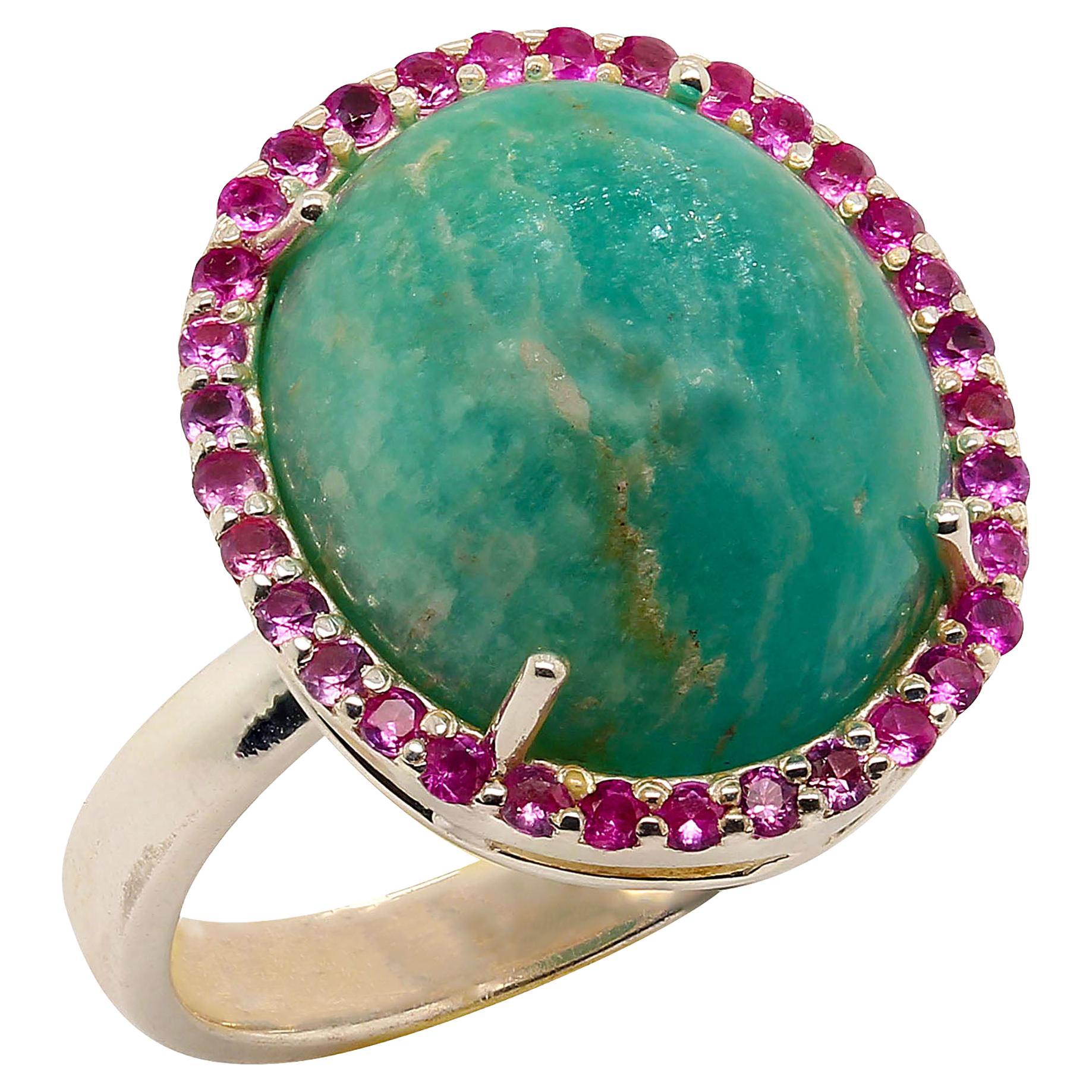 Amazonite cabochon enhanced with sparkling pink Sapphires ring to grace your hand. Amazonite is such a great green gemstone, it has wonderful features and style, and is highly polished and although opaque, it seems as if one can look right into the