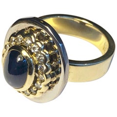 Ring Oval Cabochon Sapphire 16 Brilliant Diamonds Yellow and White Gold 18k