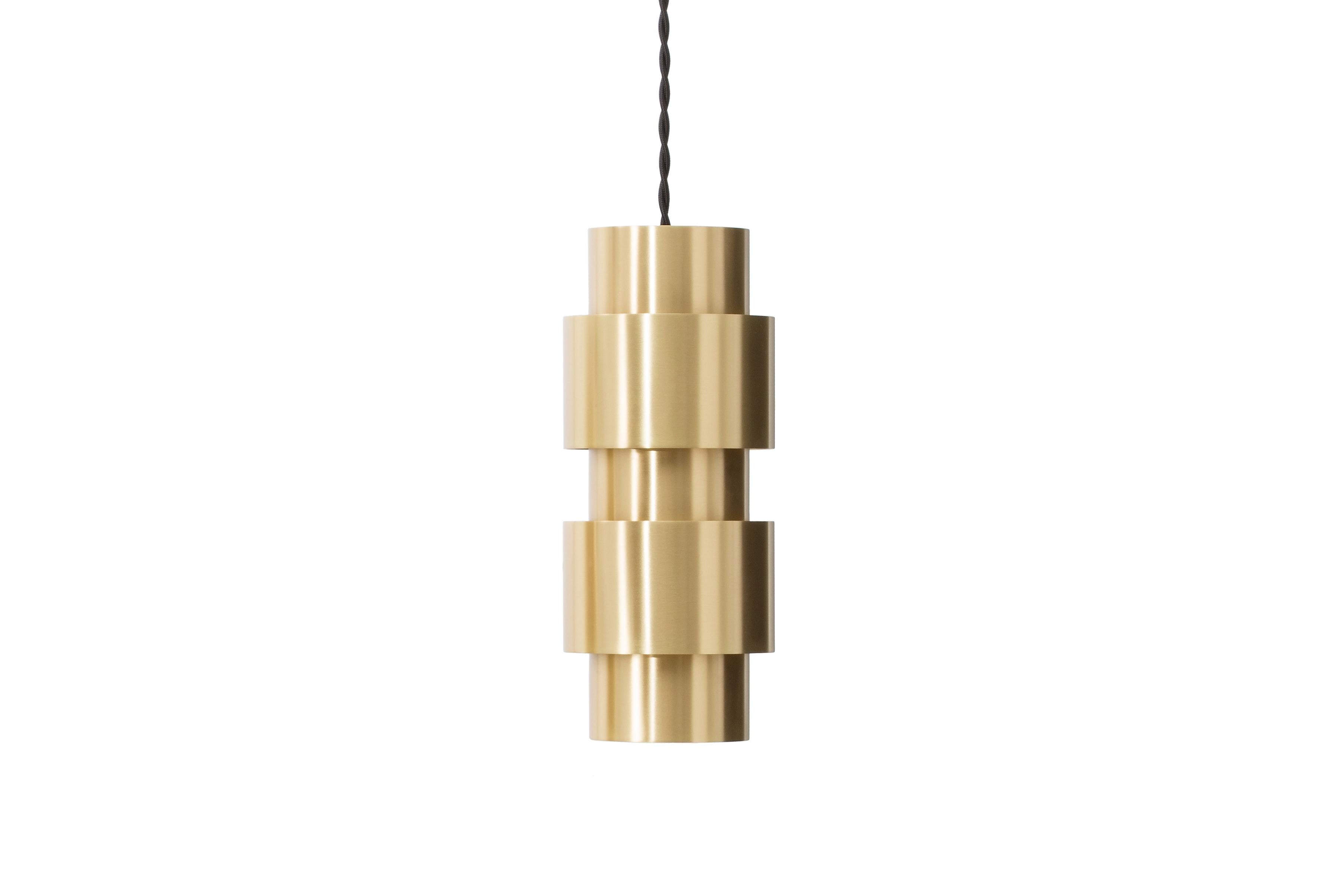 Ring pendant by CTO Lighting
Materials: satin brass with black silk braided flex
Also available in bronze and satin brass with black silk braided flex
Dimensions: H 24 x W 10 cm 

All our lamps can be wired according to each country. If sold to