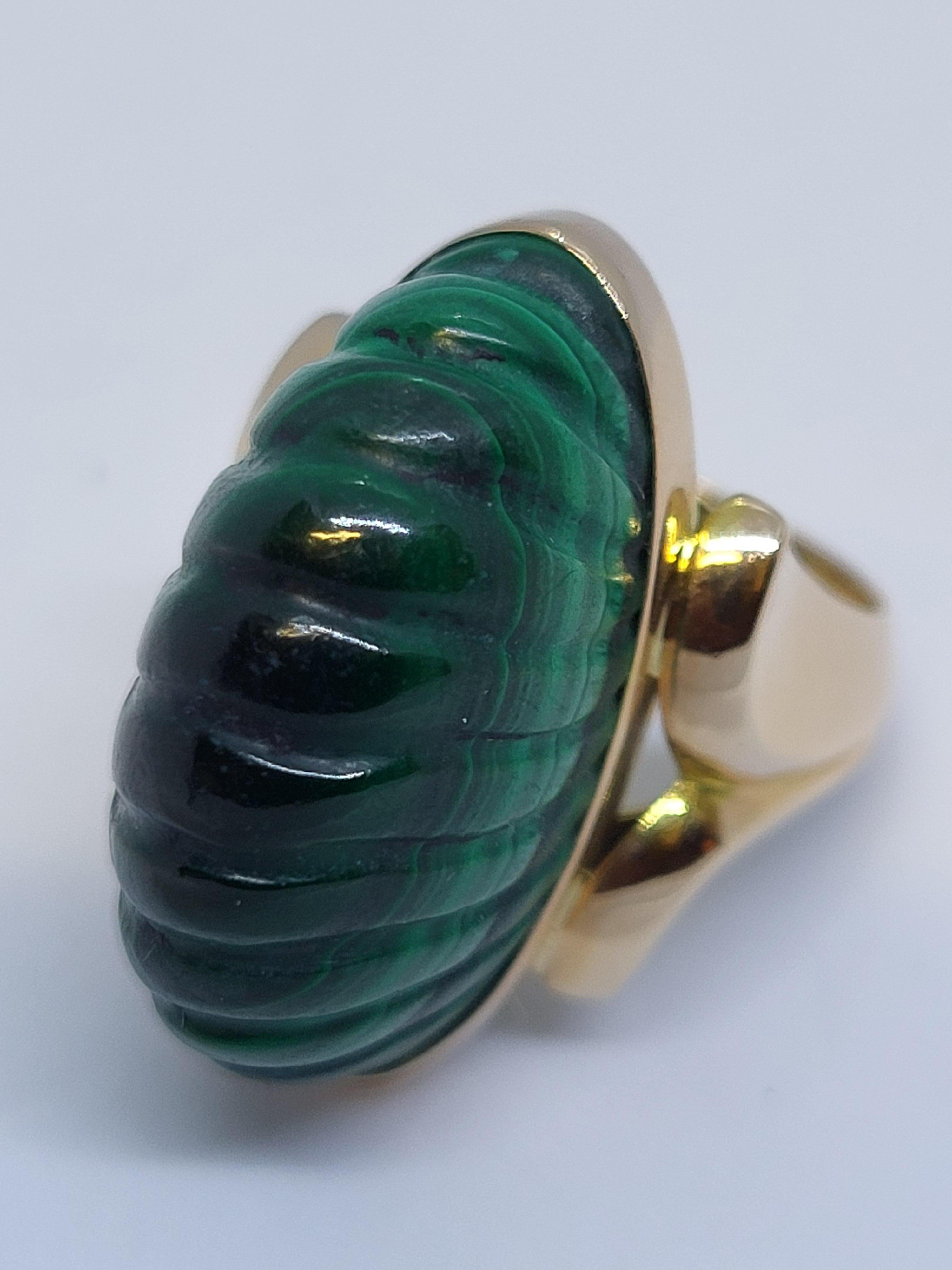 Beautifully carved malachite and rose gold dome ring made in Russia, ca. 1915.
The rich color in shades of green is enhanced by the expertise of the carver. 
A statement piece for the independant lady - colorful but elegant at the same time.
The