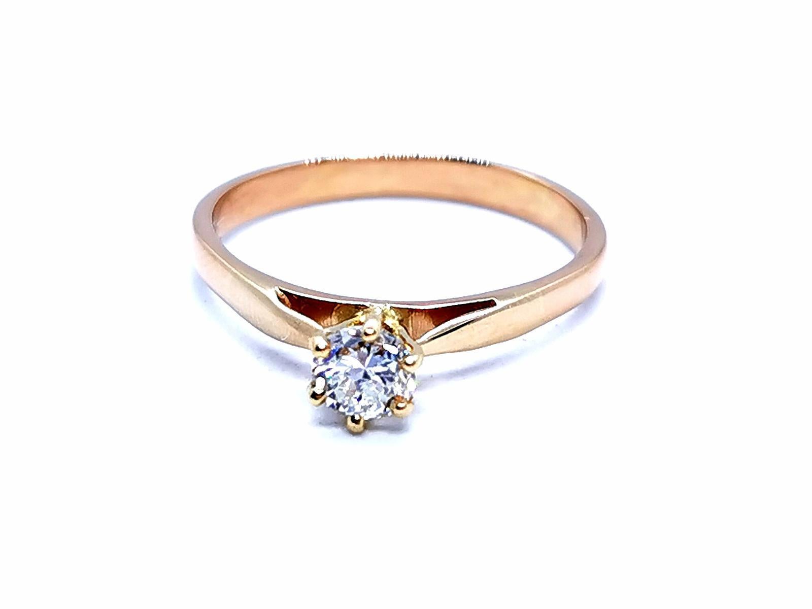 Solitary rose gold 750 mils (18 carats). set with a brilliant cut diamond of about 0.35 ct. crimp claws 6. size: 55. width on the front: 0.52 cm. total weight: 2.46 g. punch eagle's head. excellent condition
