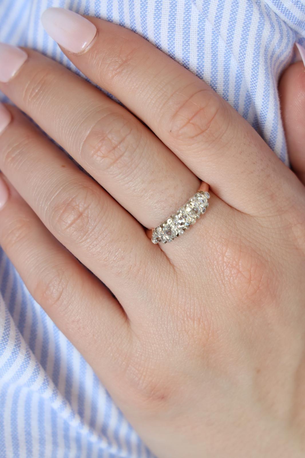 Retro ring in white and rose gold 750 thousandths (18 carats). set with 5 european old cut diamonds. total weight diamonds: about 0.85 cts. width on the top: 0.57 cm. finger size: 54. total weight: 3.03 g. owl hallmark. excellent condition