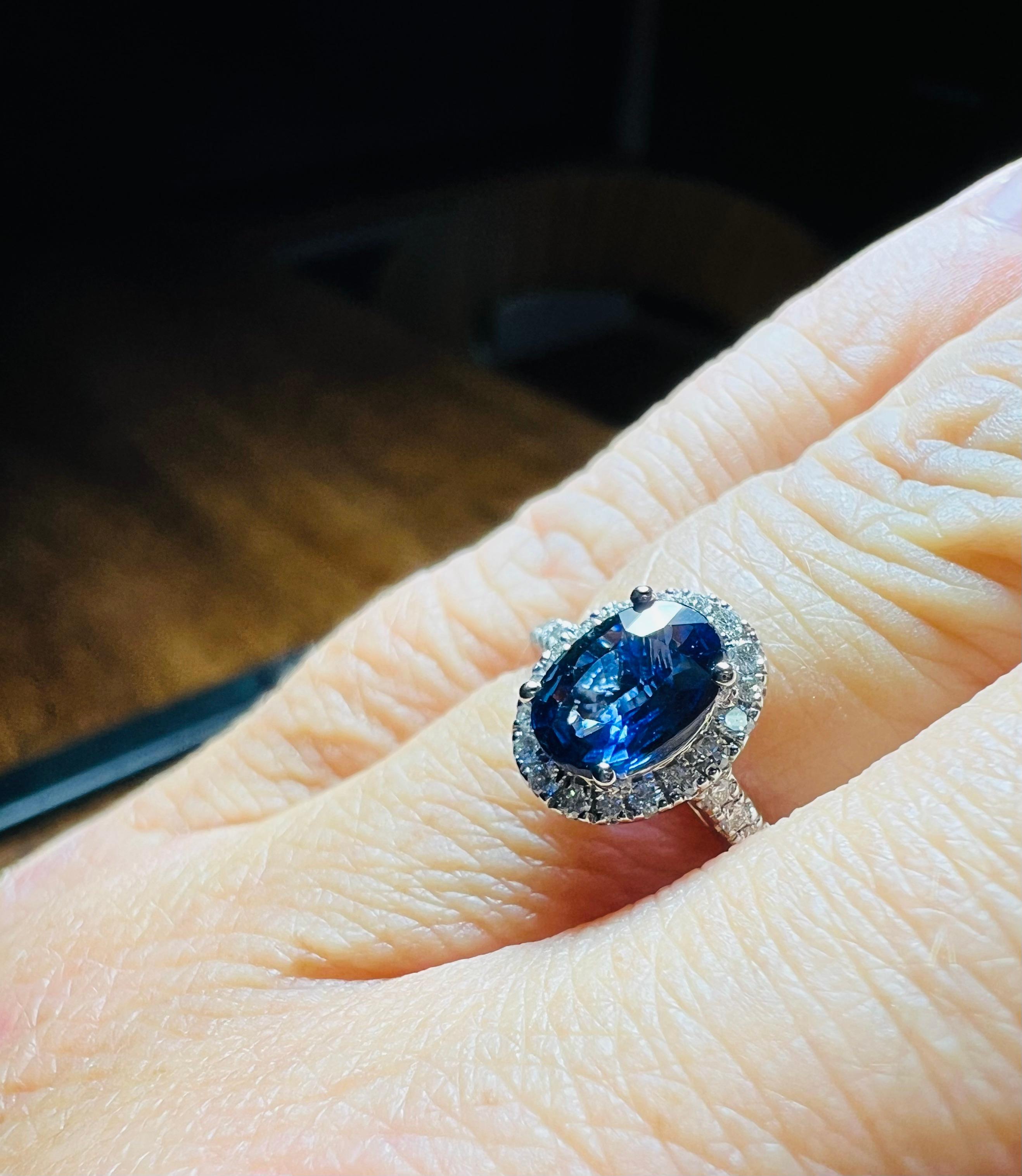 Ring Set With A Sapphire Surrounded By Diamonds, 18 Carat Gold 5