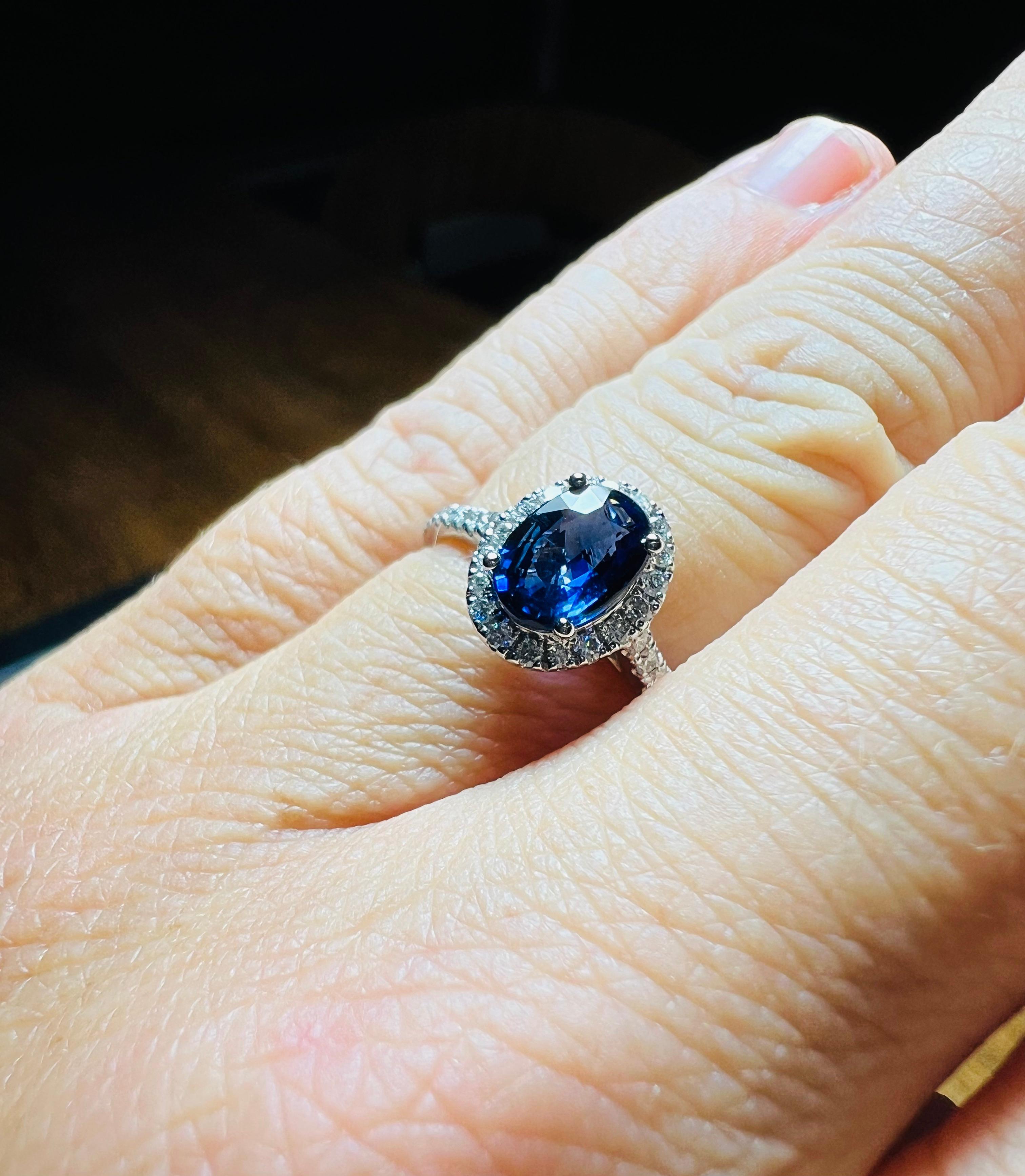 Ring Set With A Sapphire Surrounded By Diamonds, 18 Carat Gold 6