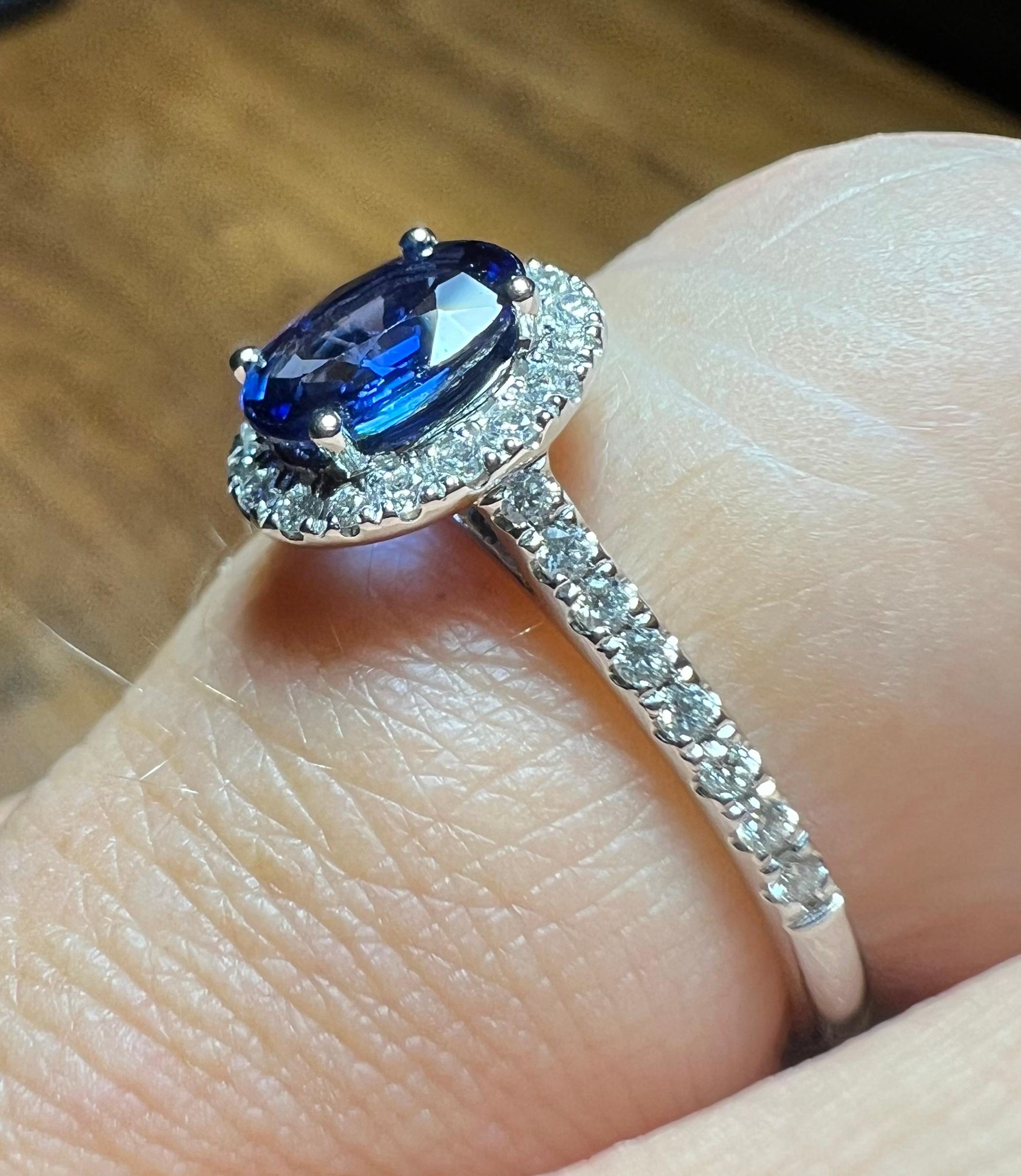 Artisan Ring Set With A Sapphire Surrounded By Diamonds, 18 Carat Gold