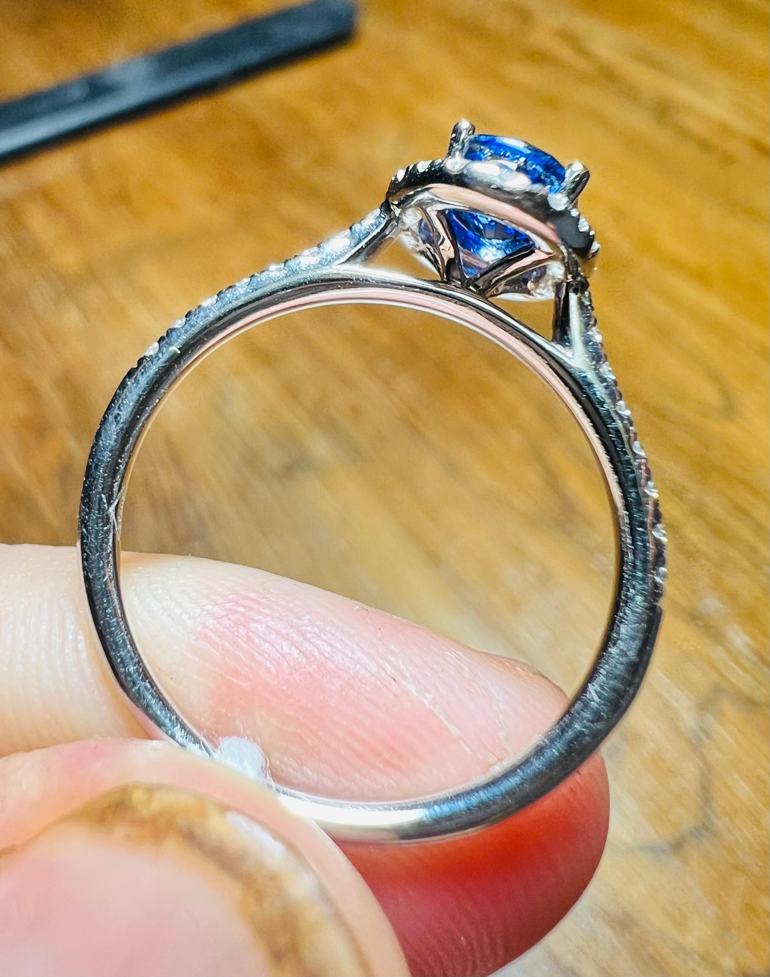 Ring Set With A Sapphire Surrounded By Diamonds, 18 Carat Gold 1