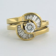 Ring set with baguette and brilliant cut diamond 0.60ct, 18k gold 5.3 grams