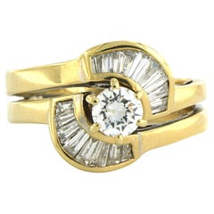 Anillo engastado con diamante talla baguette y brillante 0,60 ct, oro de 18k 5,3 gramos