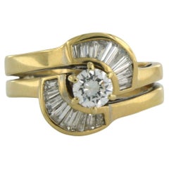 Ring set with baguette and brilliant cut diamond 0.60ct, 18k gold 5.3 grams