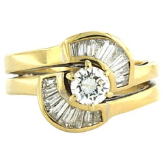 Ring mit Baguette- und Brillanten im Brillantschliff 0,60 Karat, 18 Karat Gold