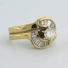 Bague sertie de diamants baguette et taille brillant 0,60ct, or 18k 5,3 grammes