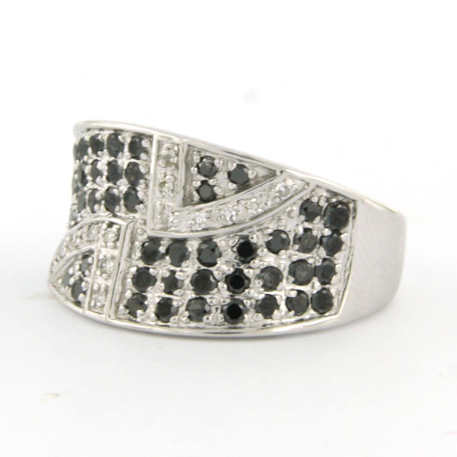 18k white gold ring set with black brilliant cut diamond and single cut diamond up to 0.85ct - F/G - VS/SI - ring size US 8 - EU 18.25(58)

Detailed description:

The top of the ring is 1.2 cm wide

weight: 4.8 grams

ring size US 8 - EU 18.25(58),