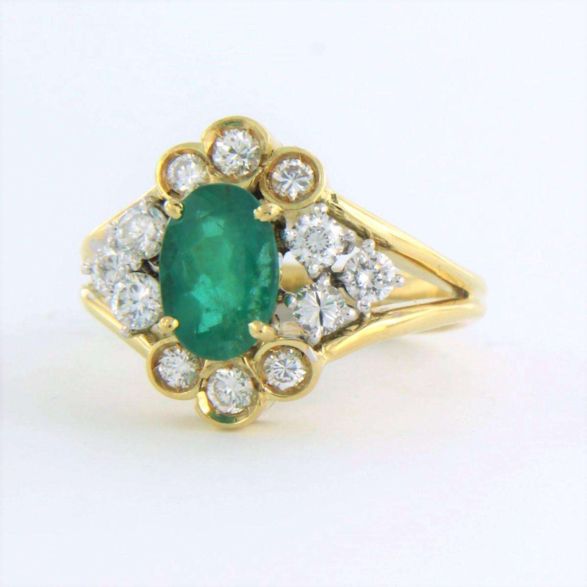 Brilliant Cut Ring set with Emerald and diamonds 18k bicolor gold For Sale