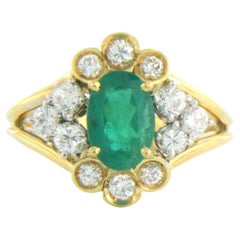 Ring set with Emerald and diamonds 18k bicolor gold