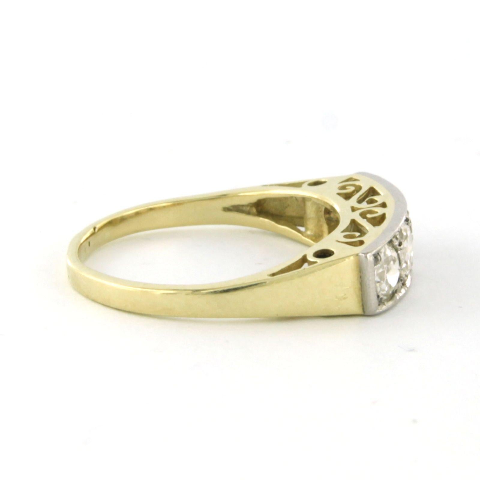 Art Nouveau Ring set with old mine cut Diamonds 14k bicolour gold