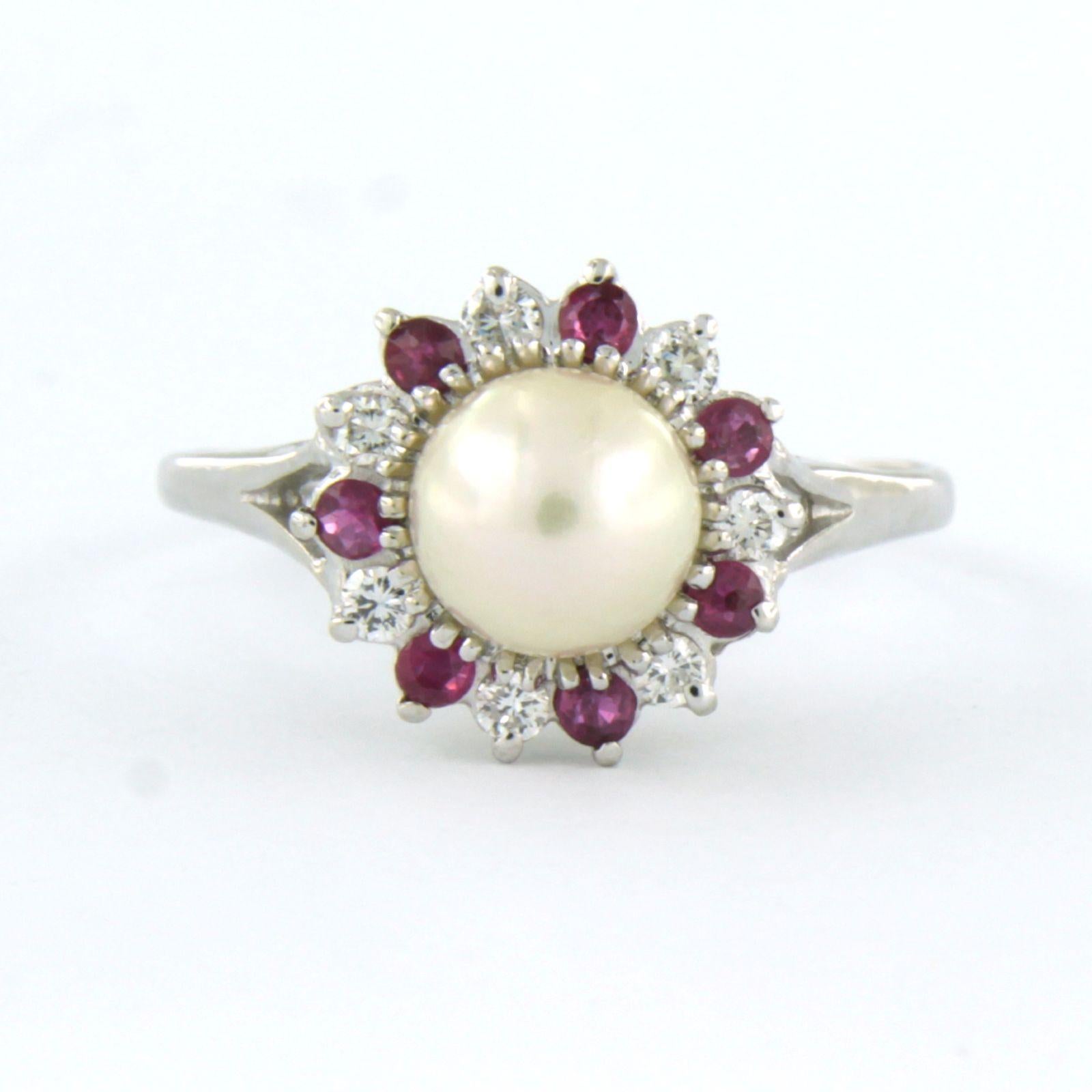 Ring aus 14k Weißgold mit einer zentralen Perle und einem Rubin und einem Diamanten im Brillantschliff 0,23ct - F/G - VS/SI - Ringgröße US 8.5 - EU 18.5 (58)

detaillierte Beschreibung:

die Oberseite des Rings ist 1,3 cm breit und 1,0 cm hoch

Ring
