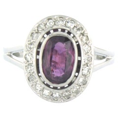 Ring set with rubelite and single cut diamond up to 0.35ct 18k white gold