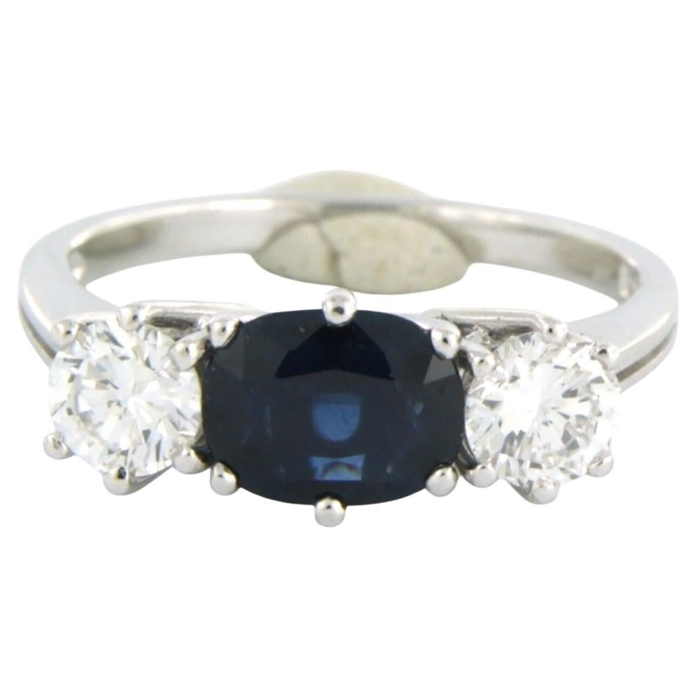 Ring set with sapphire and brilliant cut diamonds 0.80 ct, 18k gold