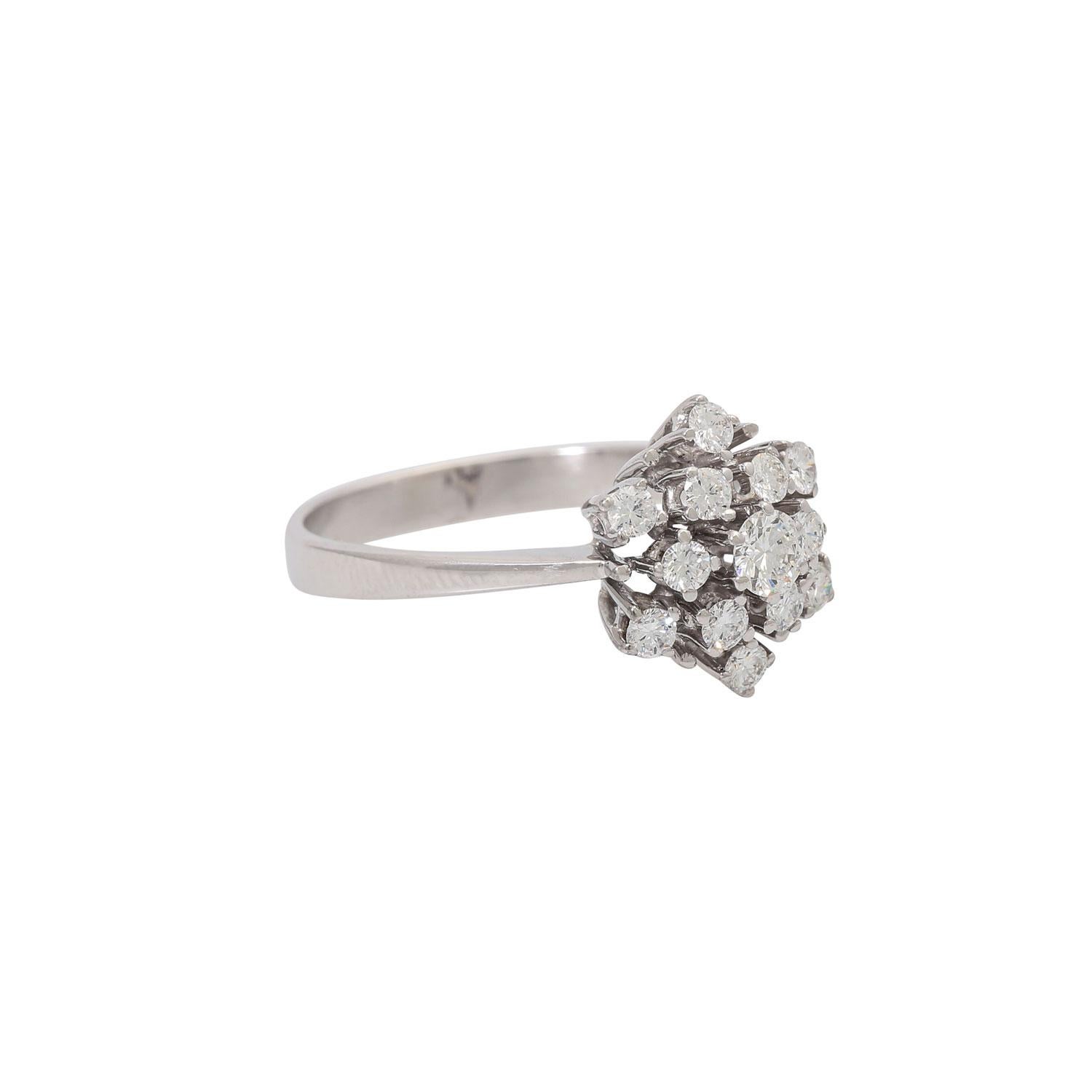 Complete approx. 0.63 approx. White (h)/vs, 1 stone best., Wg 14k, 3.7 g, RW: 59, late 20th y.h, minimal traces of carrying.
 'Snowflake 'Ring with 13 Brilliant Cut Diamonds Totalling approx. 0.63ct, approx. White (H)/VS, One Stone Chipped, 14k