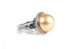 Ring South Sea Golden Pearl with Diamonds & Blue Sapphire 18Kt