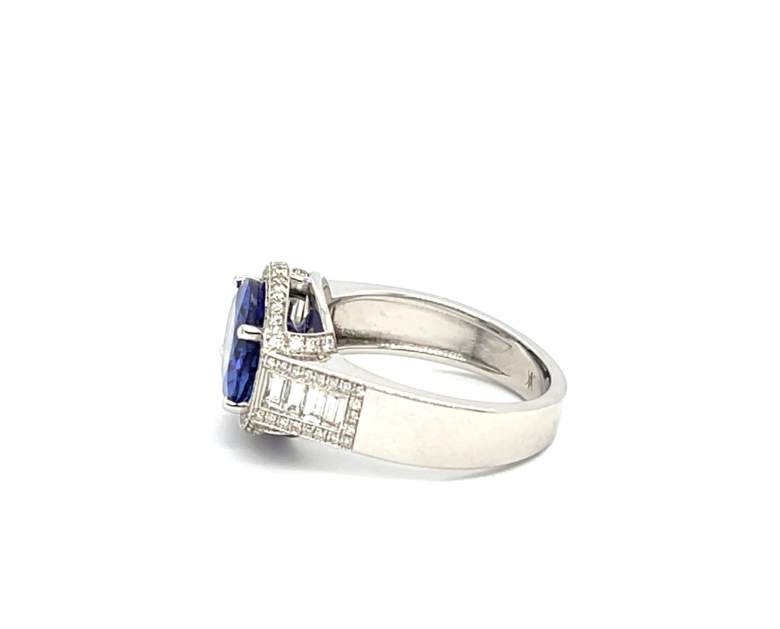 Women's Ring Tanzanite 3 , 95 Carats Diamonds 0 , 32 Carats White Gold 18 Carats