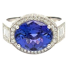 Ring Tanzanite 3 , 95 Carats Diamonds 0 , 32 Carats White Gold 18 Carats