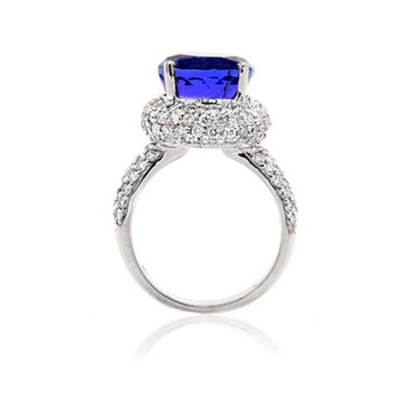  18k White Gold 8.05 ct Tanzanite Ring with 2.77ct Diamonds

The finest quality Tanzanite, mined from the foothills of Mount
Kilimanjaro, exhibits a rich purplish blue. Takat uses only the best
examples of this hue to take center stage in each