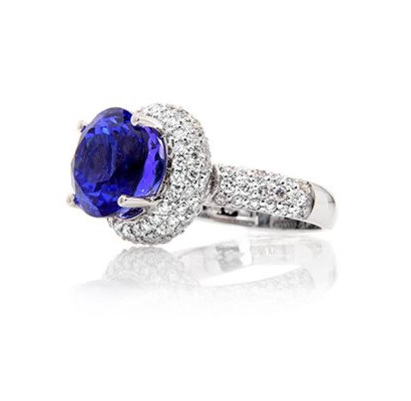 Modern  18k White Gold 8.05 ct Tanzanite Ring with 2.77ct Diamonds For Sale