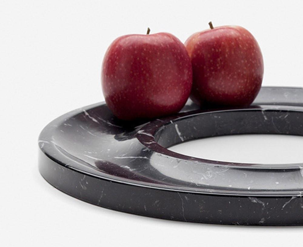 The Marblelous Ring Tray is a minimalist style round shaped centerpiece made of treated Carrara marble, manufactured according to traditional methods. 
Josep Vila Capdevila, head designer of Aparentment, was inspired by the mediterranean ancient