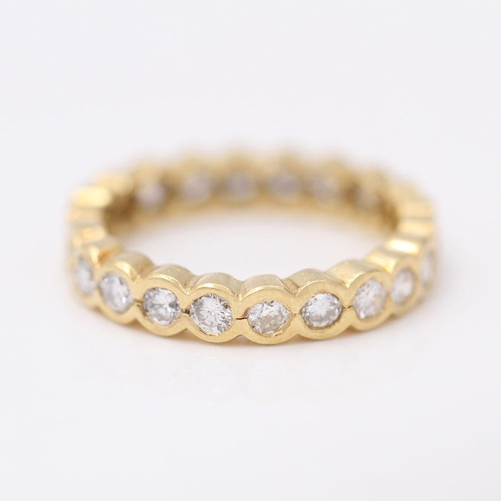 Women's Yellow Gold Ring  22x Brilliant Cut Diamonds with total weight approx. 0.77 cts., in quality G/VS-Si  Size 11.5 this ring does not allow for size modification.  This ring is 18kt yellow gold and weighs 3.33 grams.  This wedding ring is in