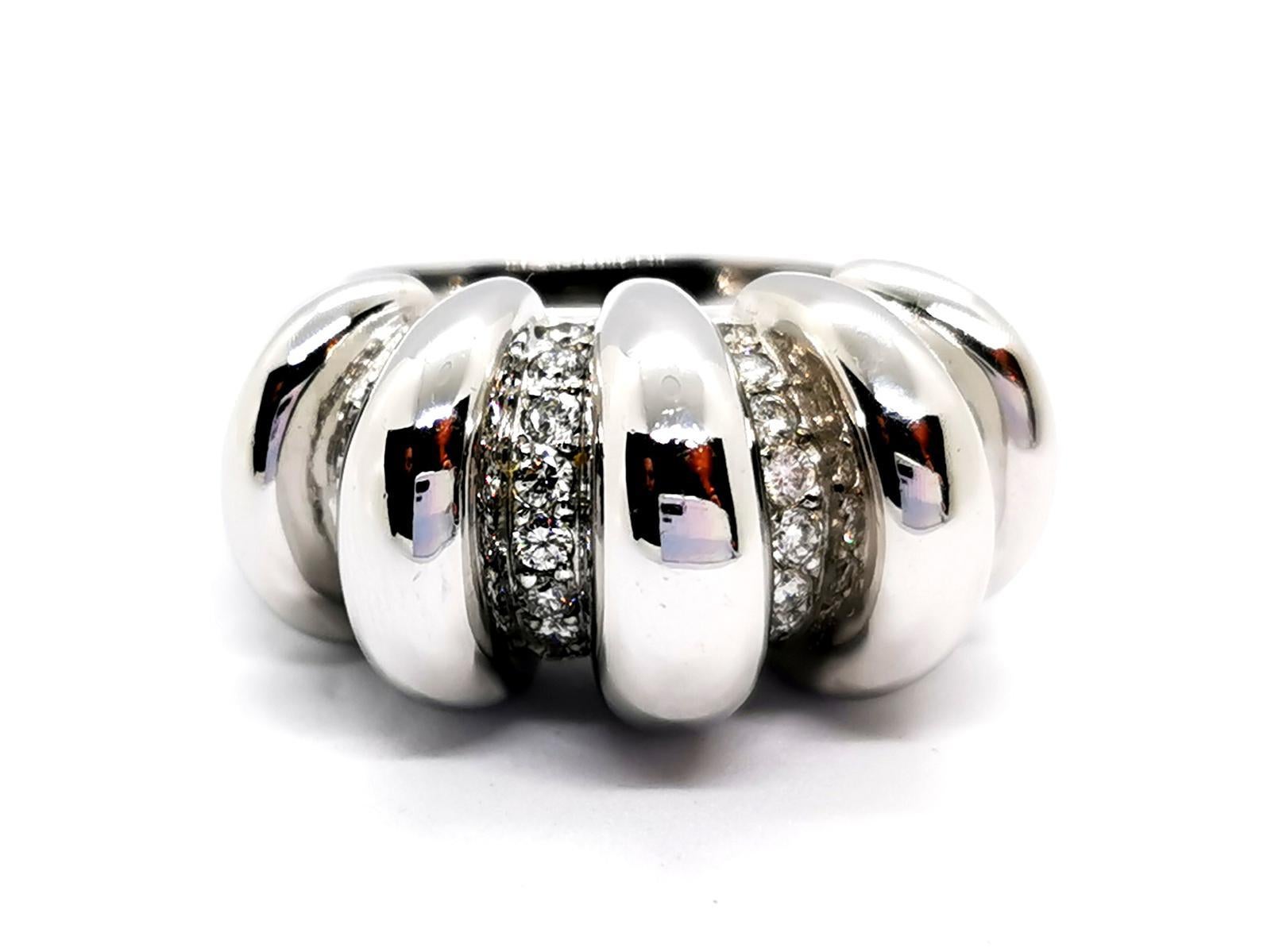 White gold ring 750 mils (18 carats). set with 36 brilliant cut diamonds. for a total of about 0.90 ct. height: 56. width on the front: 1.39 cm. height 1.32 cm . total weight: 23.12 g. punched. excellent condition
