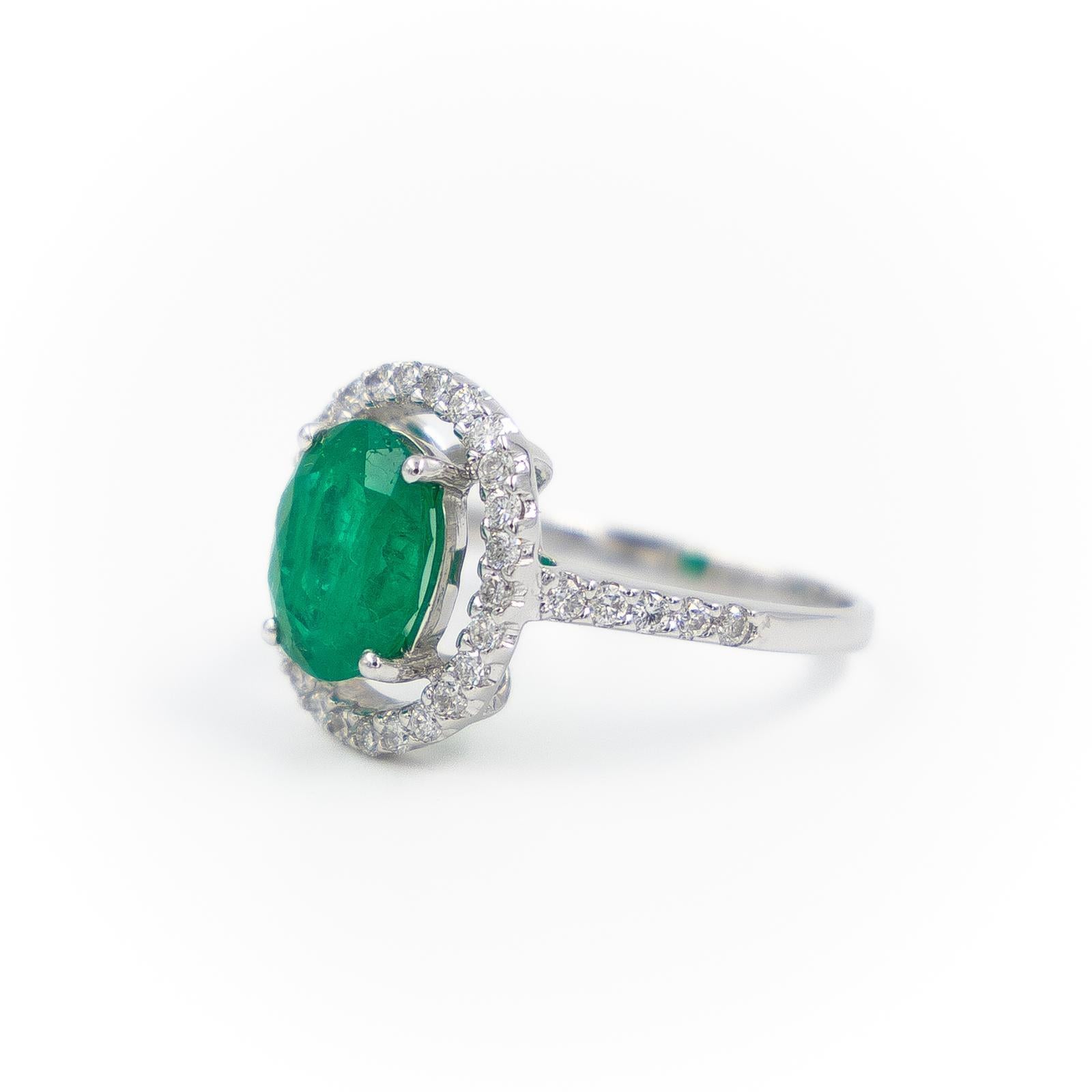 Oval Cut Emerald Diamonds White Gold Ring For Sale