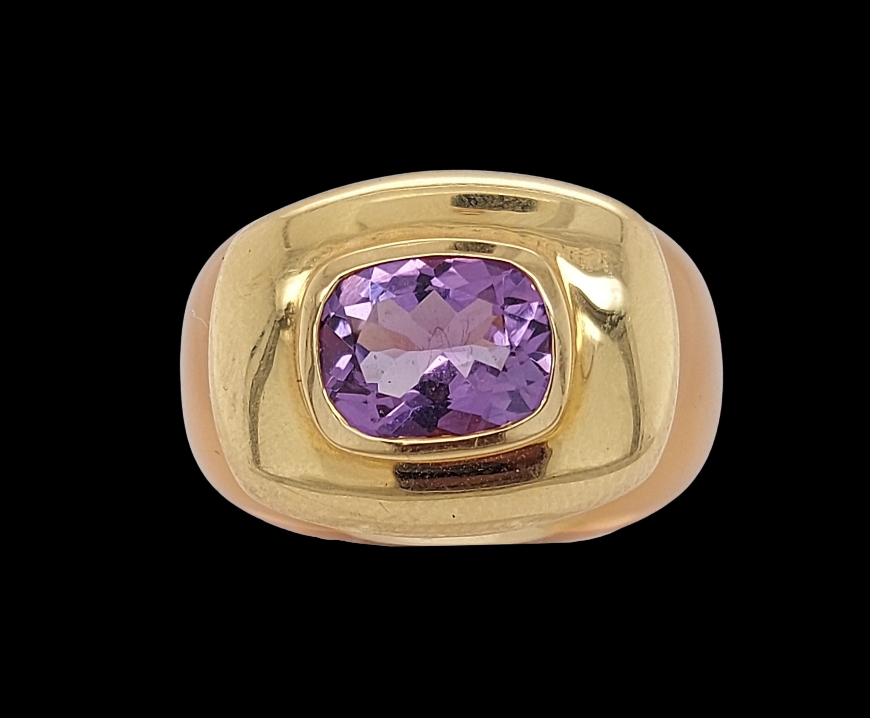 Very Unique and Gorgeous Ring with 18kt Yellow Gold & Purple Semi Precious Stone

Stone: Purple semi precious stone of approx. 3ct

Material: Band of the ring material is unknown but its very special, but the stone is set on 18kt yellow gold