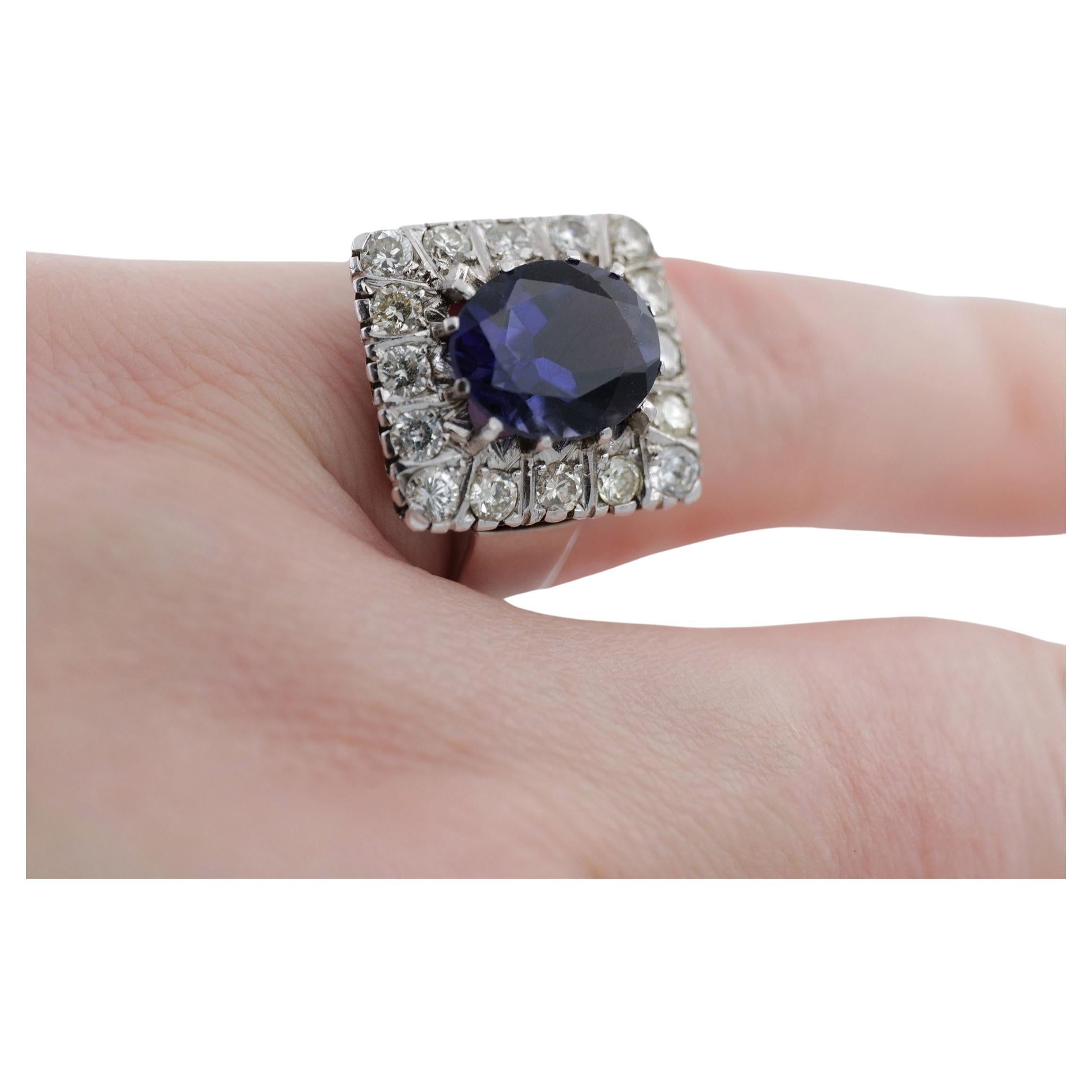 Ring with 2 carat tanzanite stone and diamonds in 18 ct. white gold For Sale